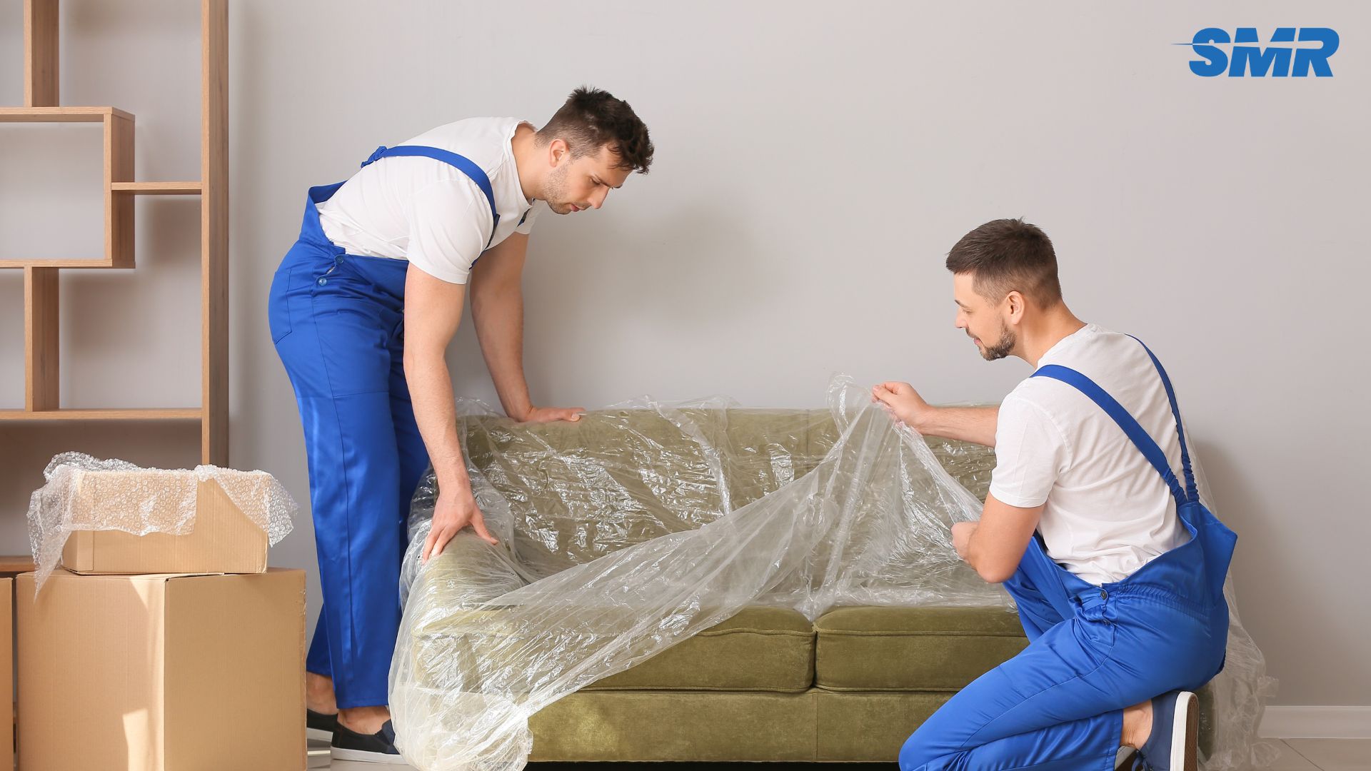 Man and van Chingford team loading furniture into a removal van in E4