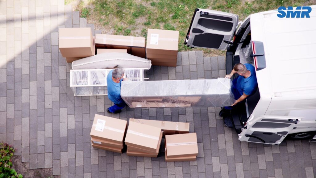 man and van Battersea team loading furniture into removal van in SW11