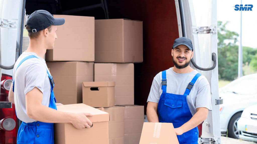 Man and van team unloading furniture outside a Bayswater apartment
