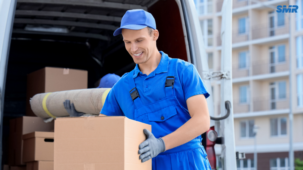 Man and van team unloading furniture in Golders Green NW11