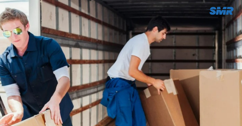 man and van Fulham team loading furniture into removal van London SW6