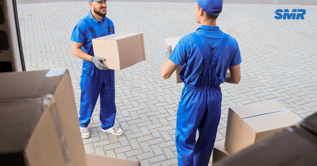 Man and van Hammersmith team loading furniture into a branded removals van in W6 London
