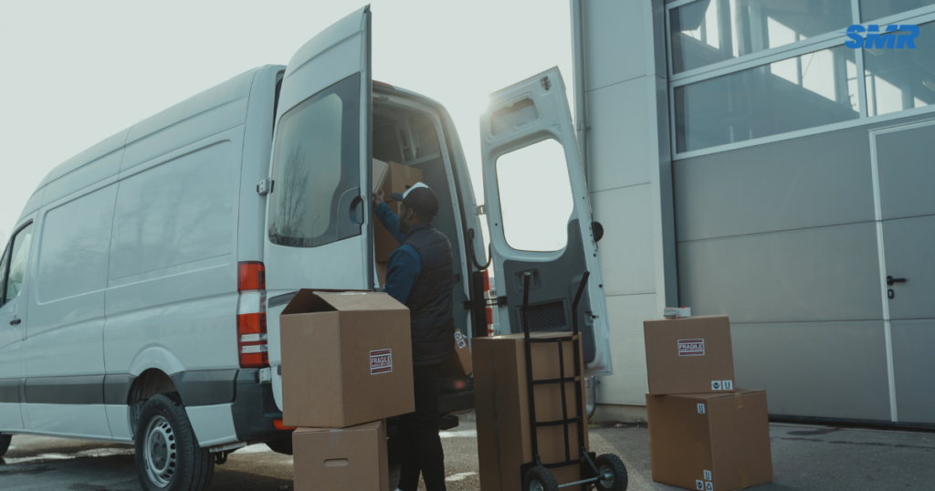 Man and van Limehouse movers loading furniture into a removals van in Limehouse London E14