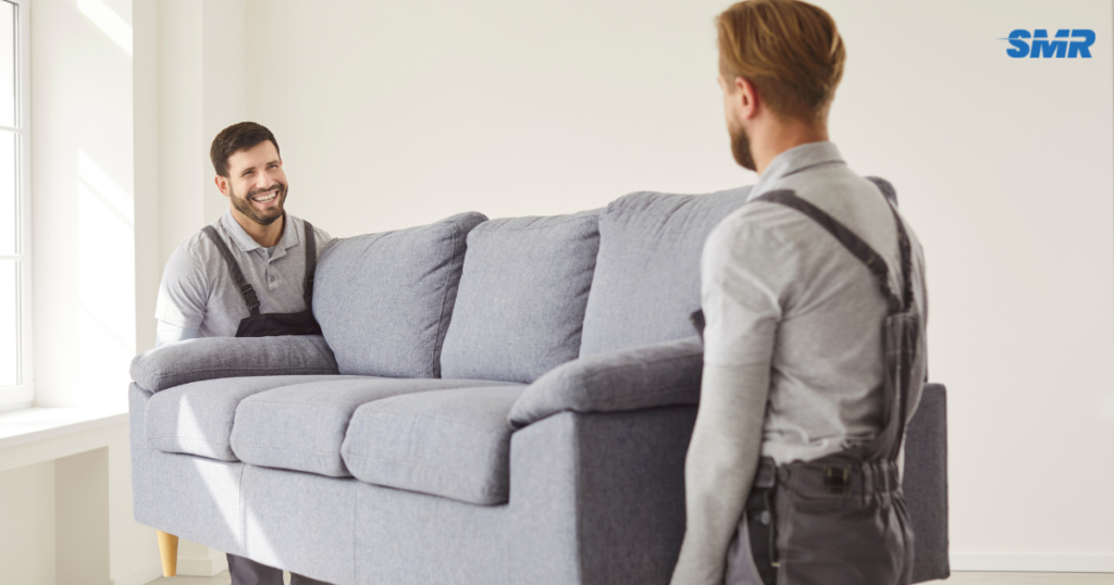 Man and Van Homerton single item mover carrying sofa in Homerton E9