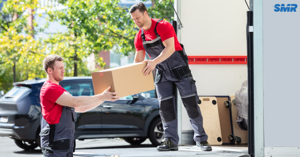 house removals Osterley with movers assisting in loading boxes and furniture