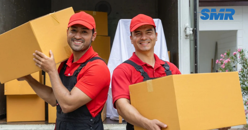cheap man and van Grays team carrying boxes during house removals
