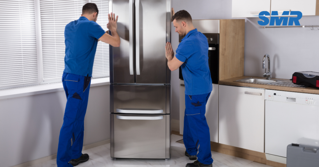 cheap man and van Gospel Oak loading boxes during house removals