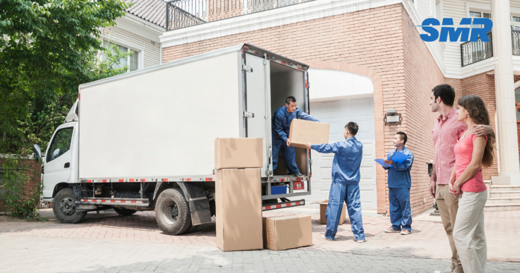 cheap man and van Gospel Oak loading boxes during house removals