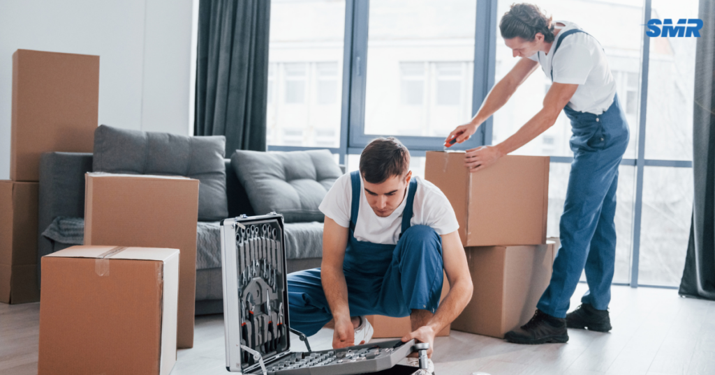 cheap man and van Greenwich loading boxes during house removals