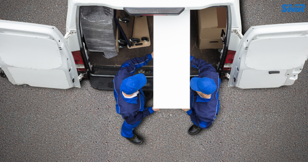 cheap man and van Forest Gate Cheap team carrying boxes during house removals