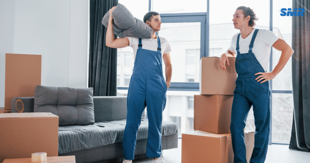 cheap man and van Gunnebury loading boxes into van during house move
