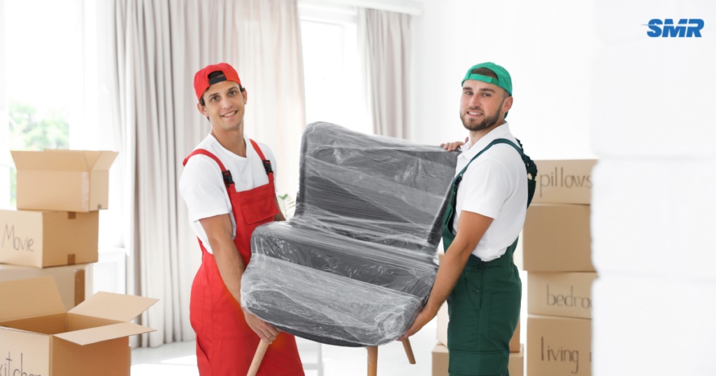 cheap man and van Hendon Cheapest Cheapest house removals team carrying sofa in UB4