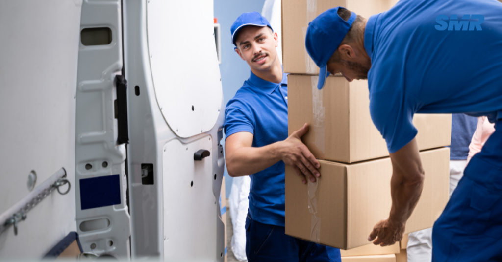 man and van interior with organised wrapped moving boxes