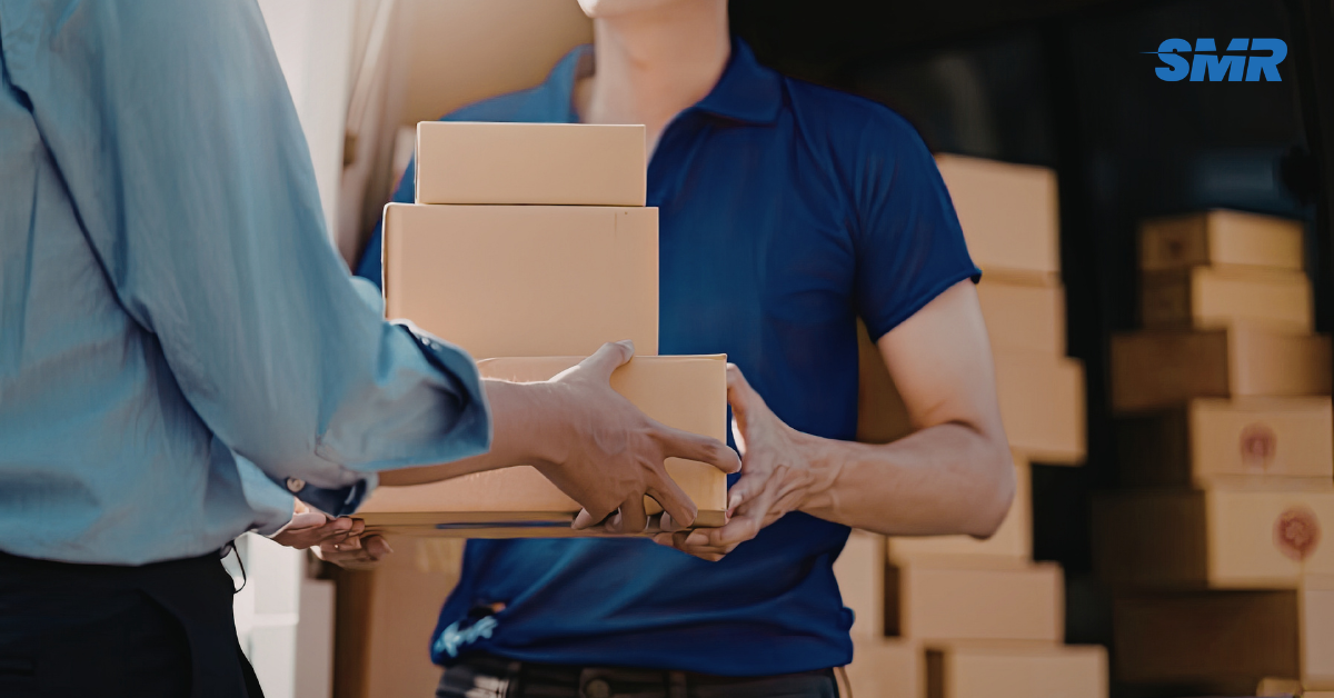 mover handing box to customer in Greenwich SE10