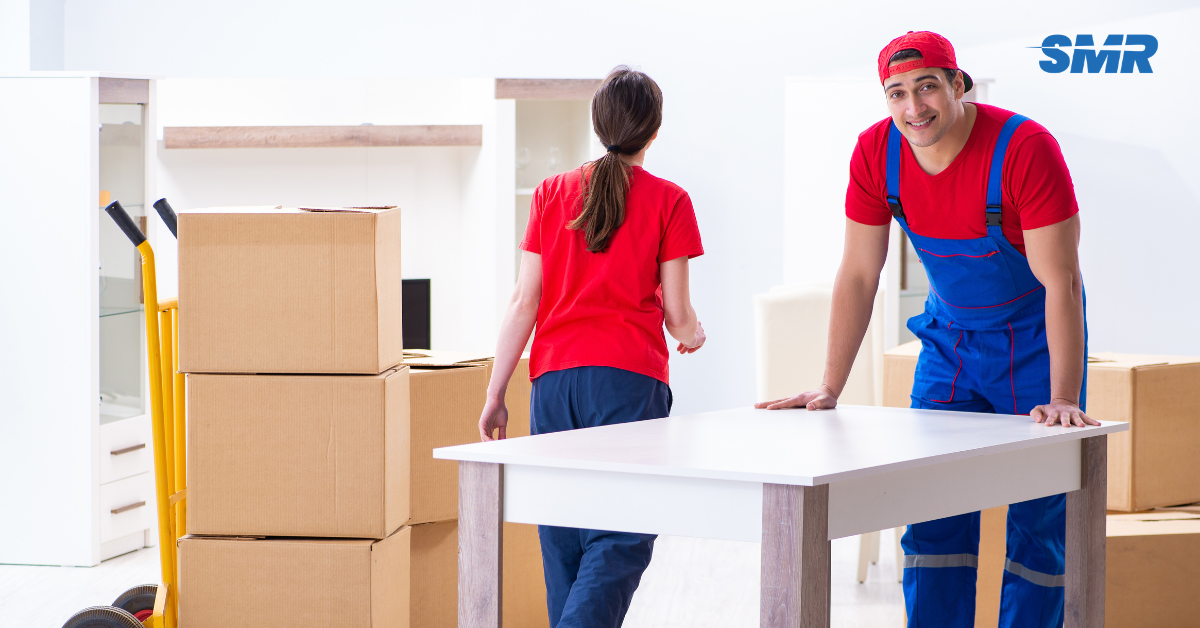 Man and Van Parsons Green movers loading furniture into removals van in SW6