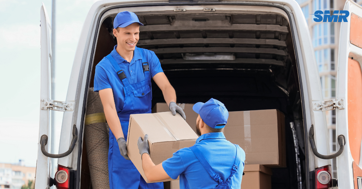 house removals Lambeth movers carrying sofa into home