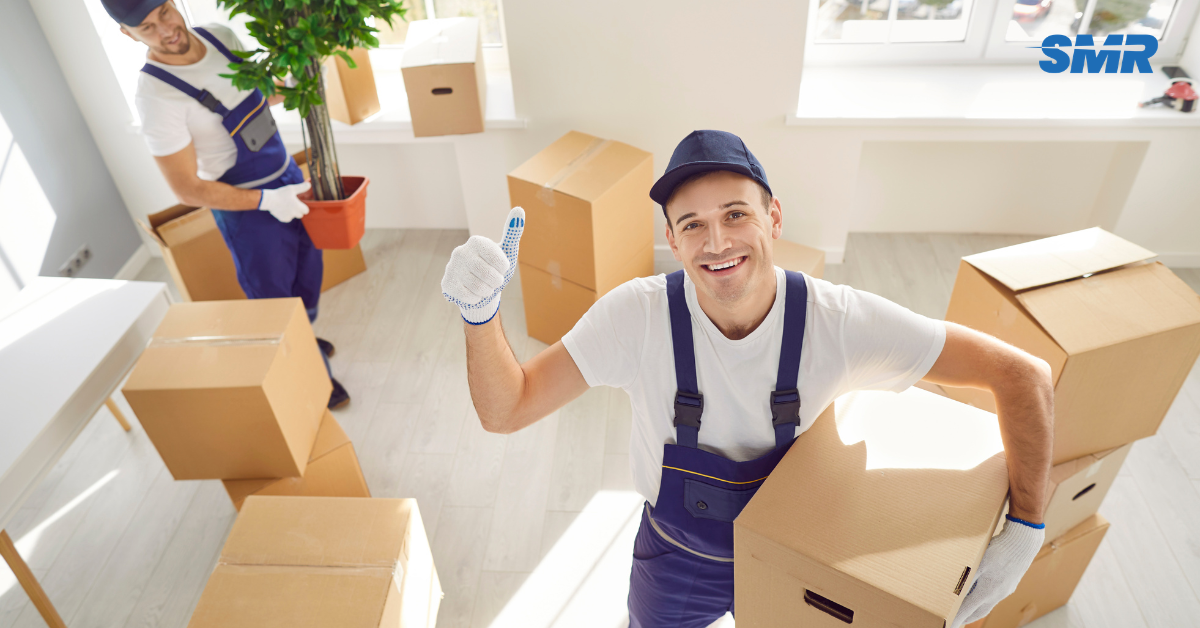 Man and van team unloading furniture in Beckton London