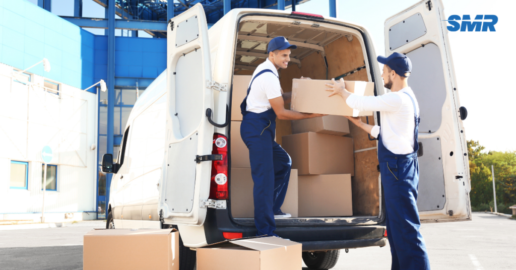 Professional Man and Van Stratford team loading furniture into a removals van