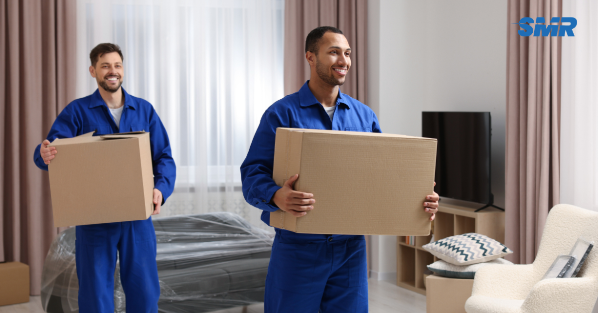 house removals Lewisham movers carrying sofa into home