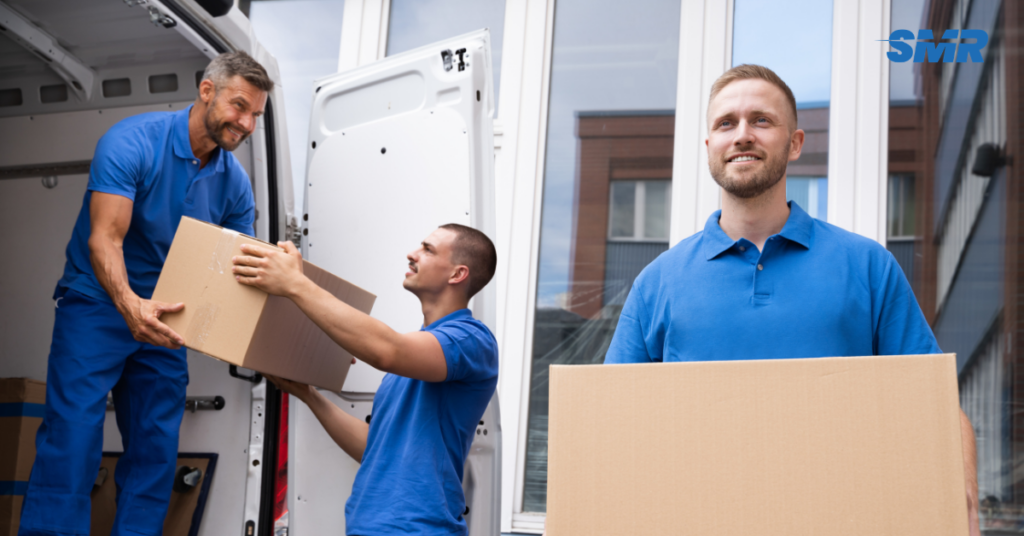 Professional man and van team loading household items for a home move in Eltham SE9