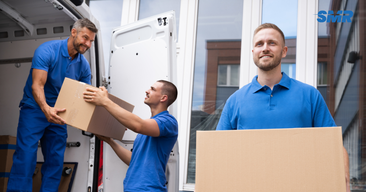 man and van Maida Vale movers loading branded removal van outside property