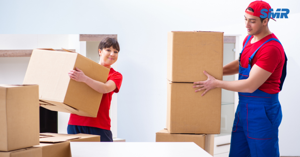 Man and van for single item Gunnersbury movers carrying sofa into flat
