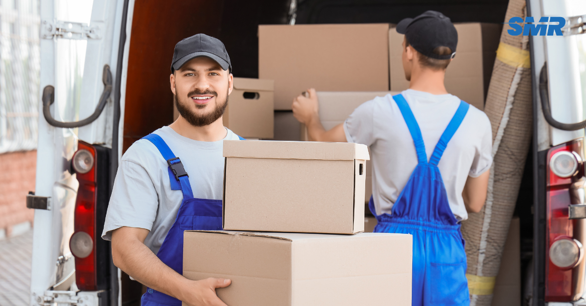 man and van Leytonstone movers loading branded removal van outside property