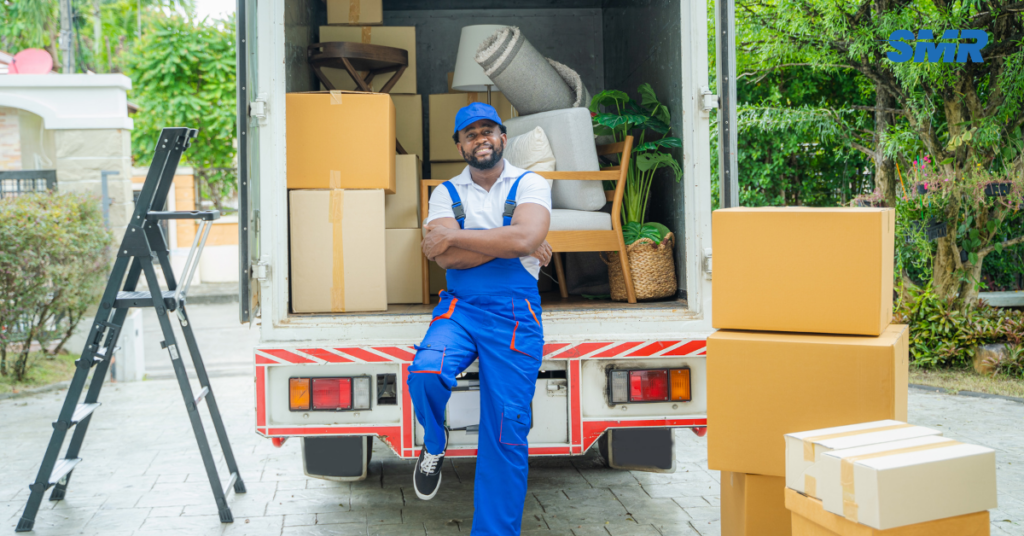House removals Stoke Newington movers carrying furniture