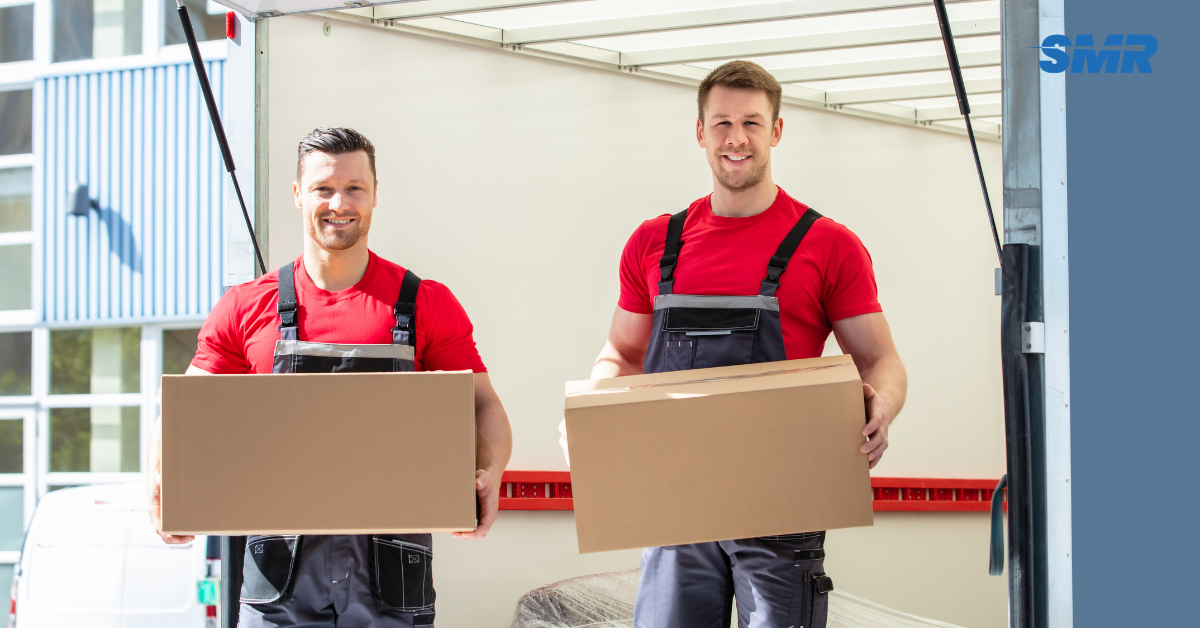 Man and Van Peckham movers loading furniture into removals van in SE15