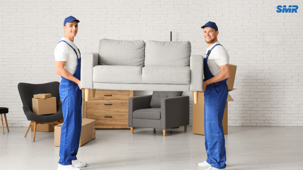 Office removals team in Ilford moving desks and office equipment.