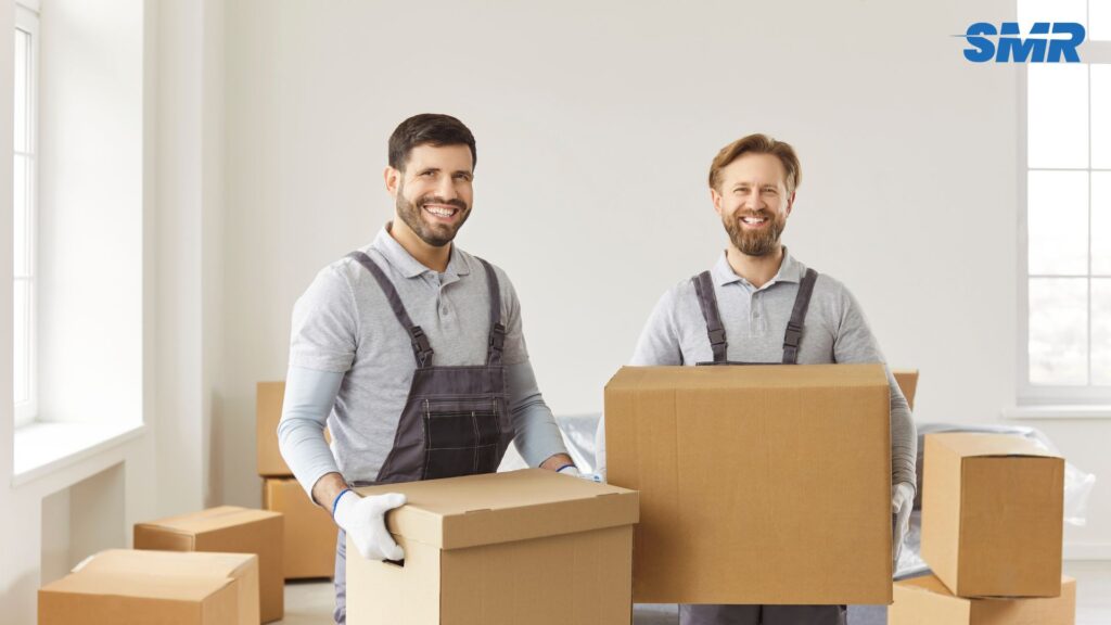 Man with a van Ilford moving a sofa or large appliance for a single-item removal.