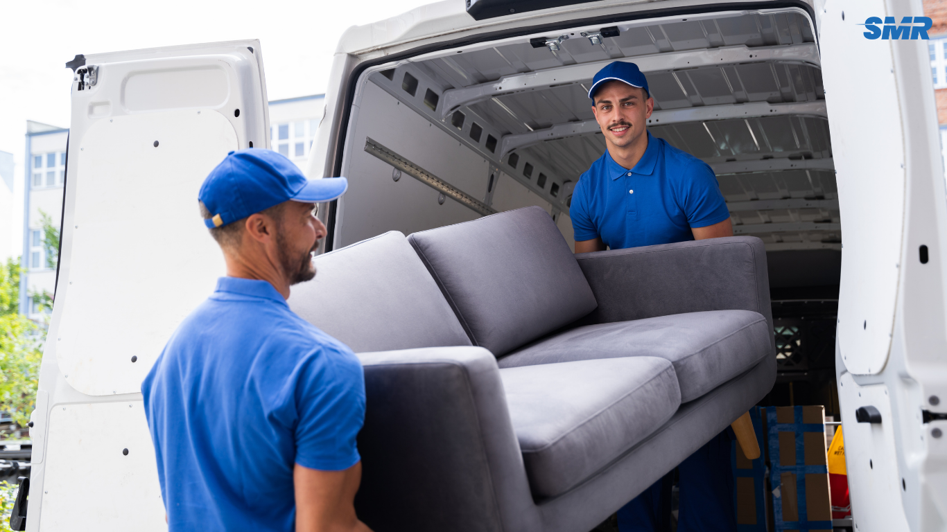 Man and van team loading furniture in Lambeth