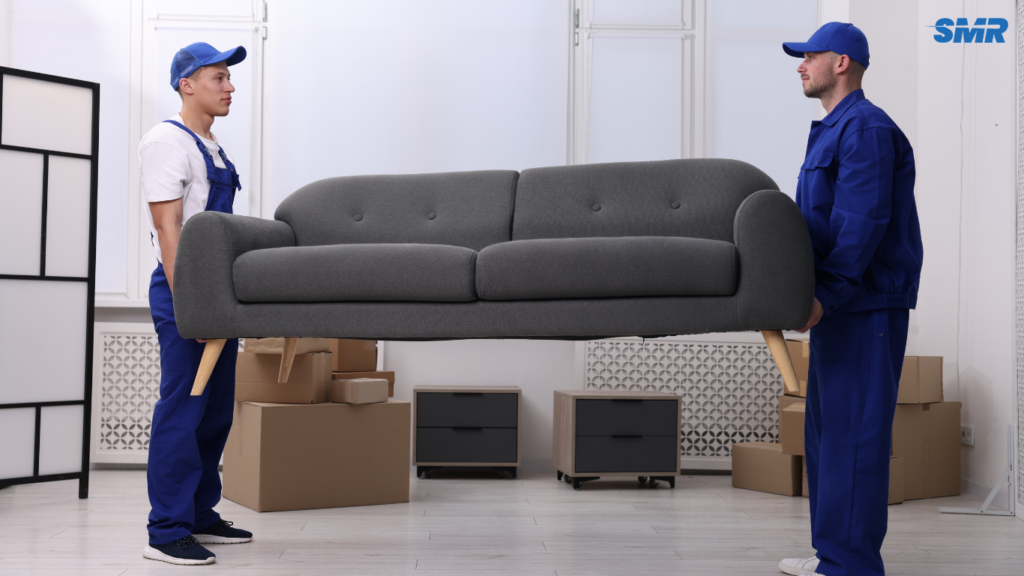 Office removals Kentish team moving desks, chairs, and office equipment.