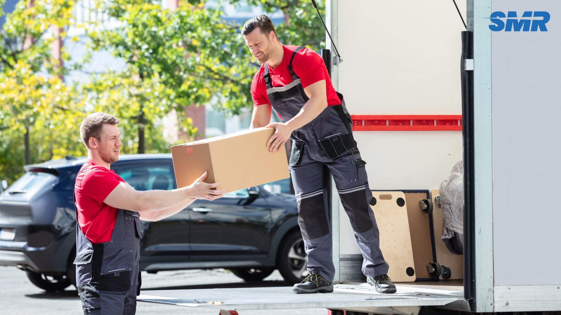 Professional movers unloading furniture in Lewisham