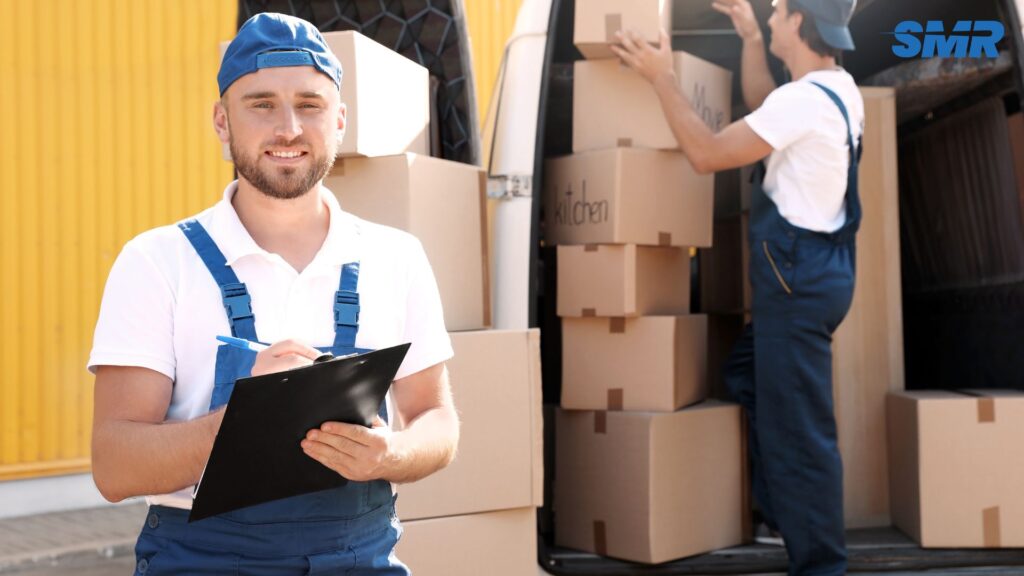 Mover carrying sofa for delivery service in Beckenham