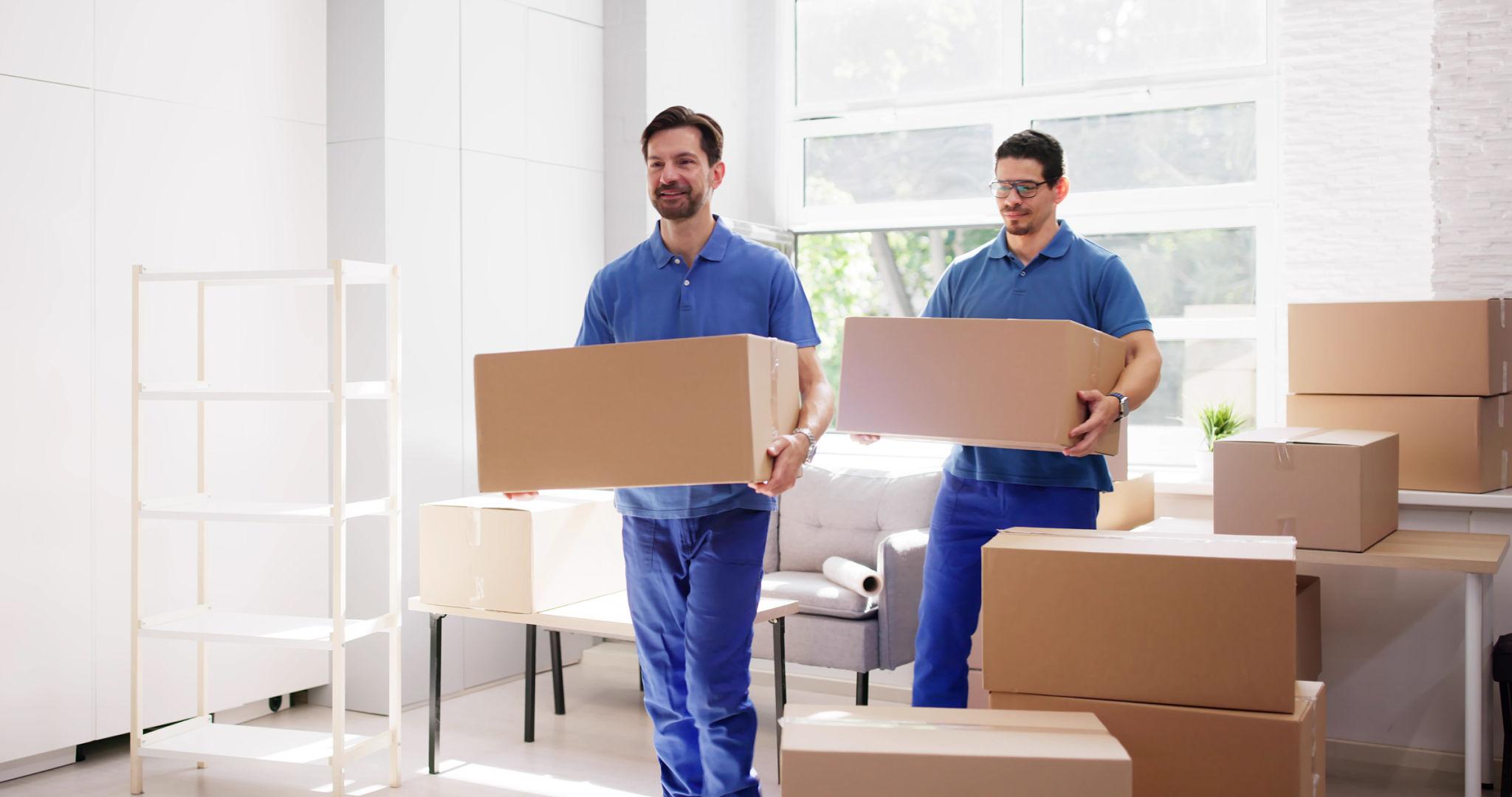 Sureman Removals man and van Greenford team loading furniture into removal van in Greenford UB6