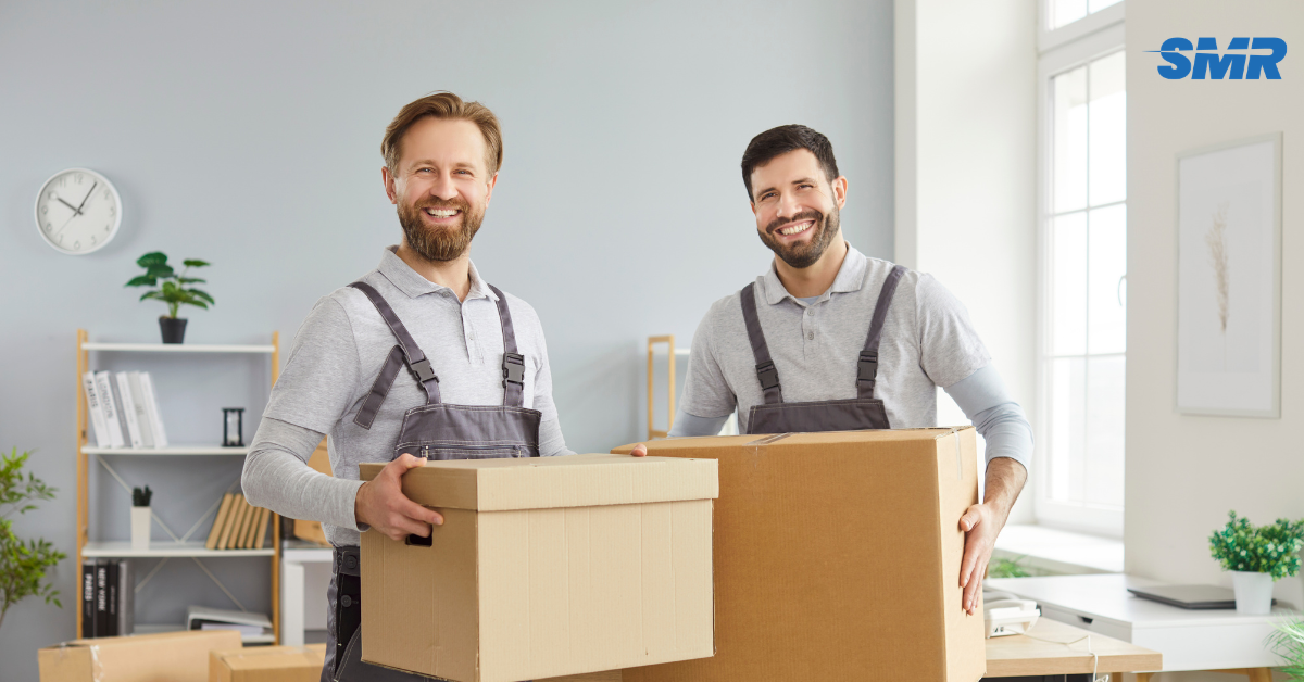 Experienced movers carrying furniture during a house removal in Hornchurch