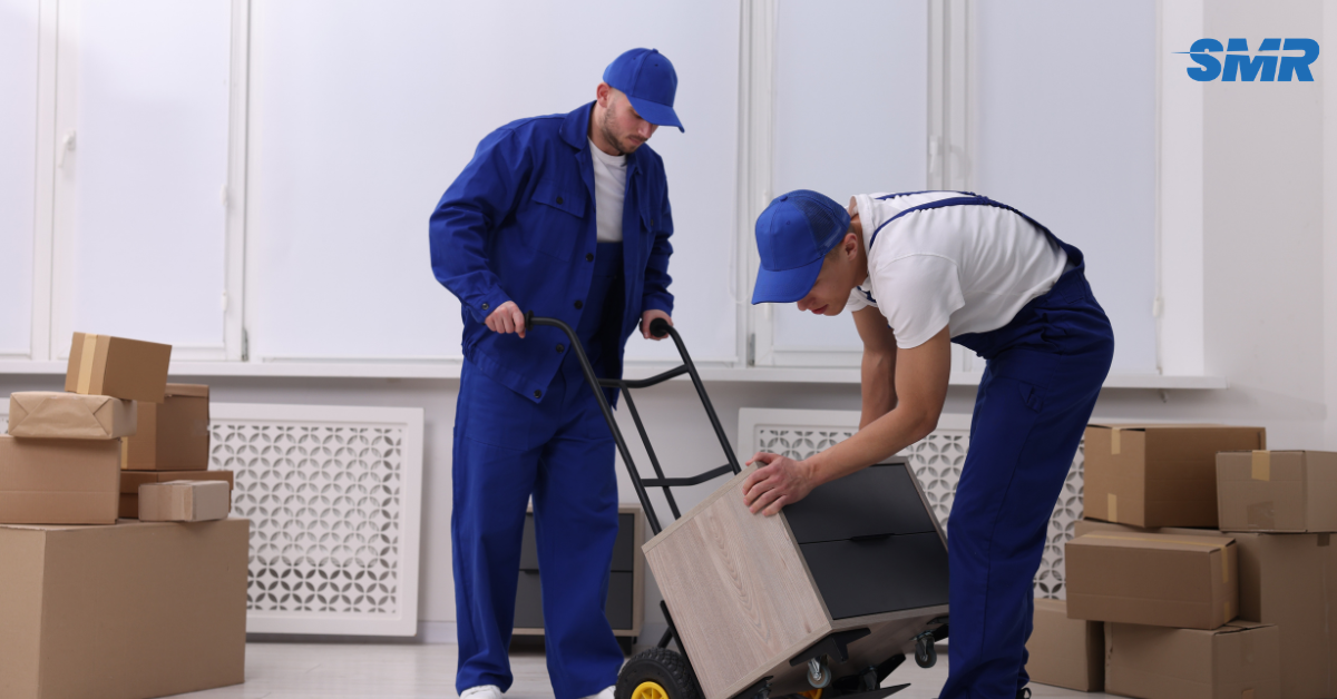 Professional man and van team loading a removal van in Islington EC1R