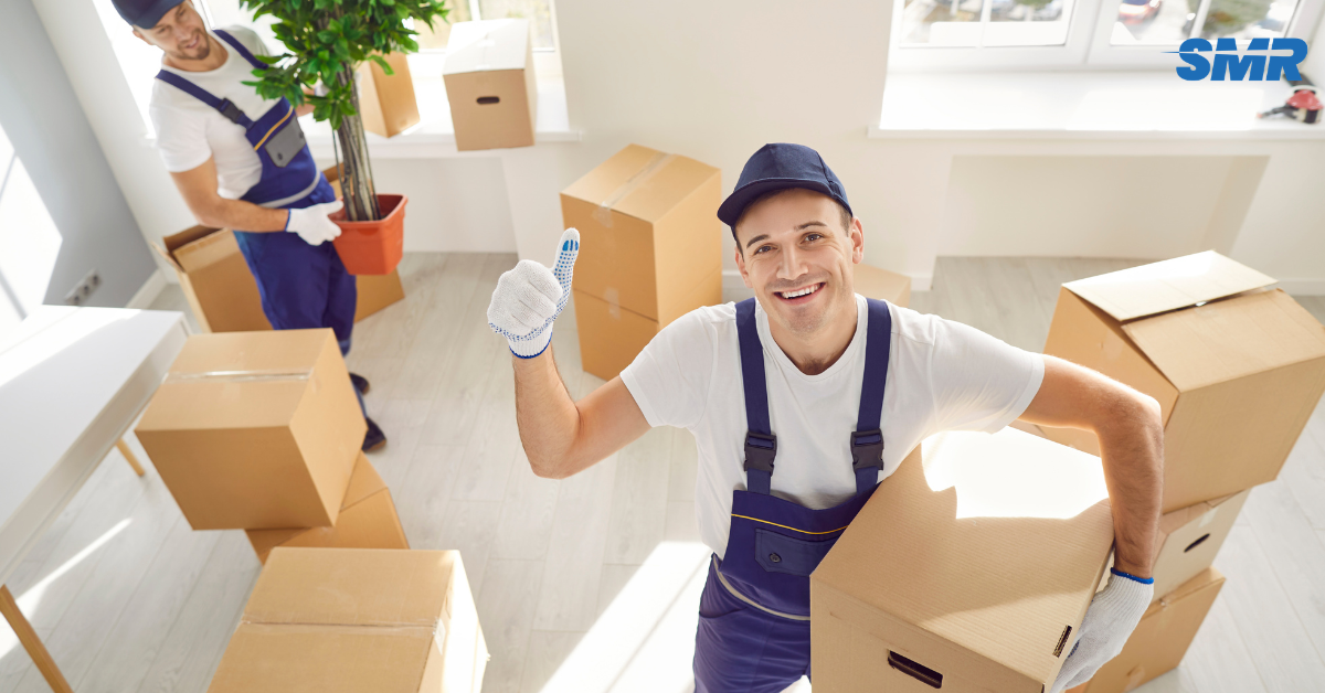 Professional man and van team loading a removal van in Islington EC1R
