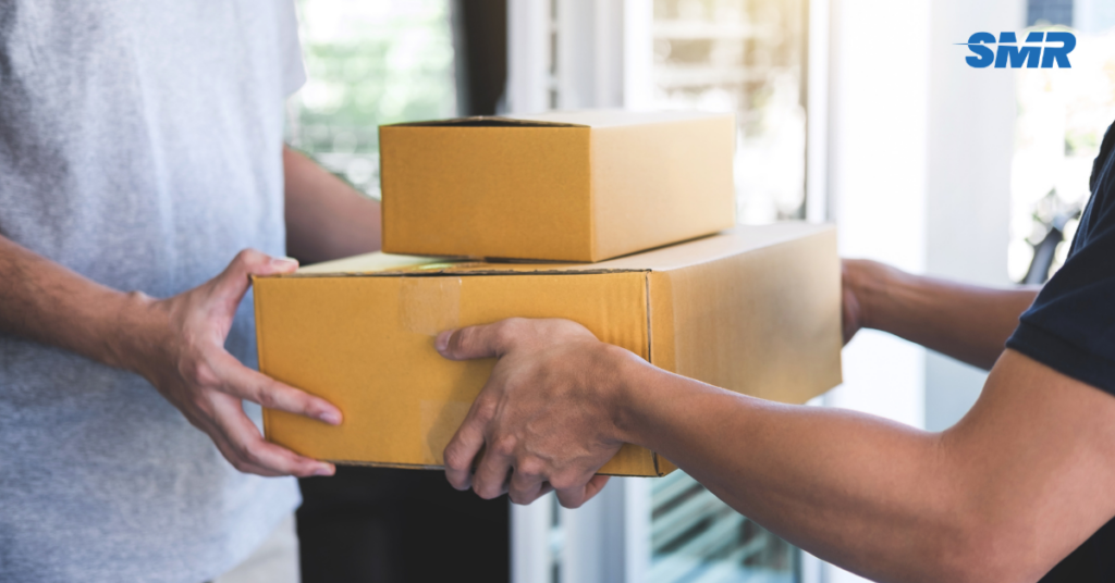 Mover handing boxes in Seven Sisters
