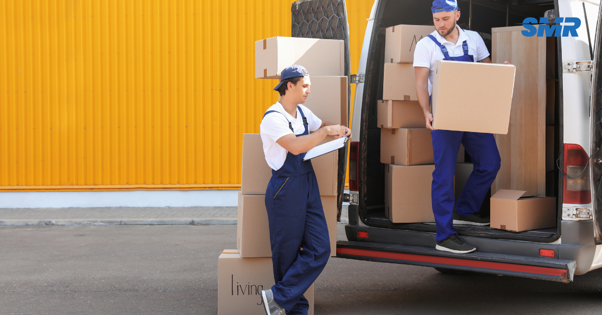 Professional man and van Harrow movers loading furniture into a removal van in Harrow