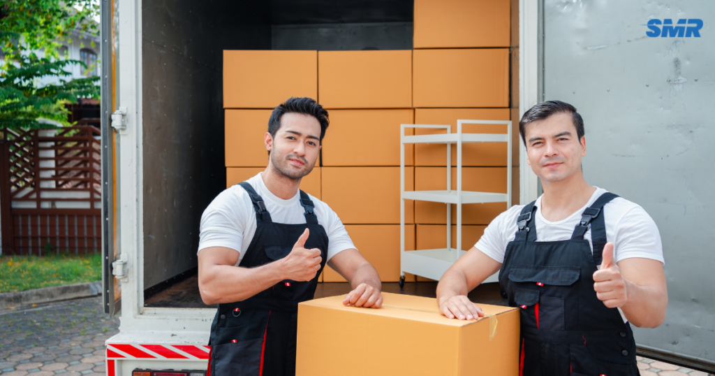Man and van Kilburn single item furniture delivery service movers carrying sofa