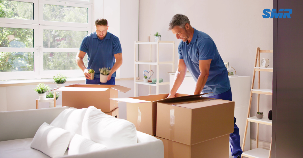 Professional man and van team loading furniture and boxes in Finsbury N4