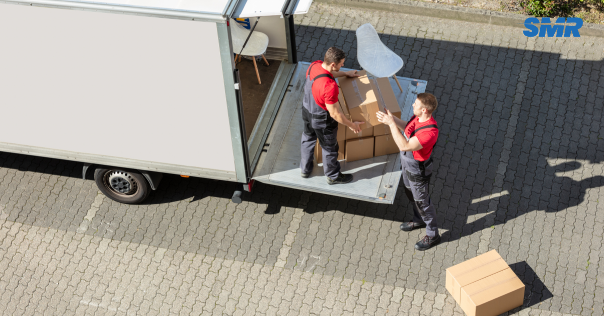 Professional man and van team loading furniture and boxes in Enfield EN1