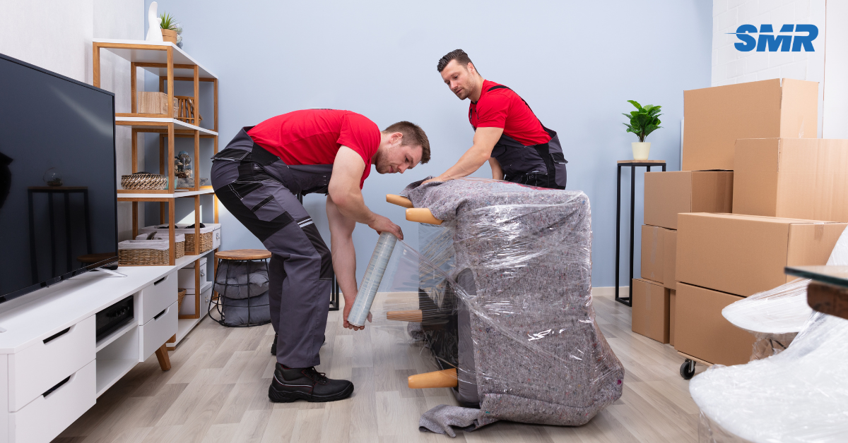 Movers carrying household and office items in Bermondsey