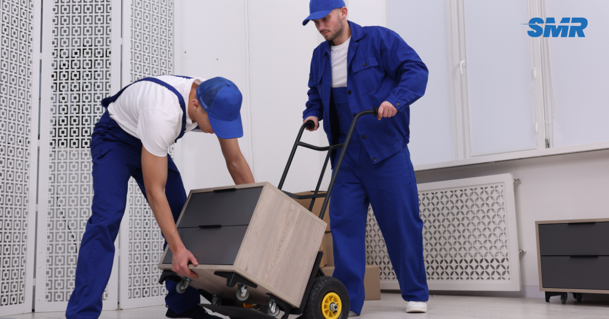 Professional man and van team loading furniture and boxes in Chelsea SW3