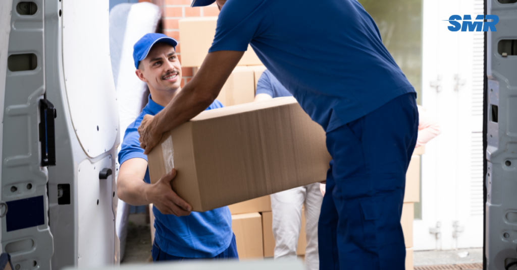 Man and Van W5 London movers loading boxes into a removals van