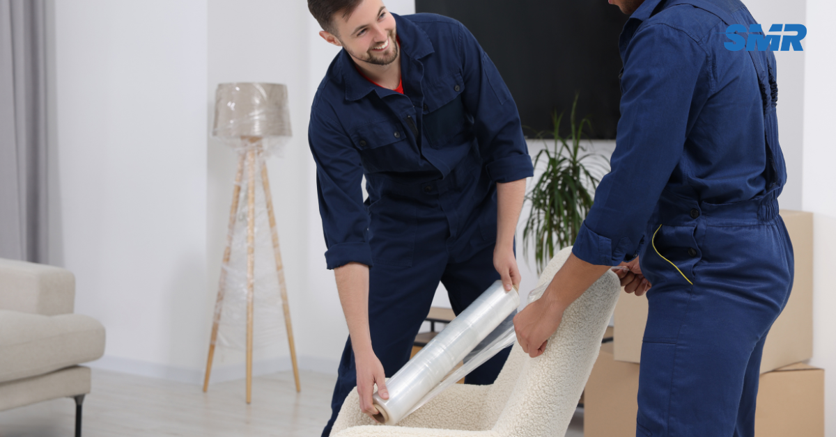 Office removals SE2 London man and van team moving business boxes and office chairs