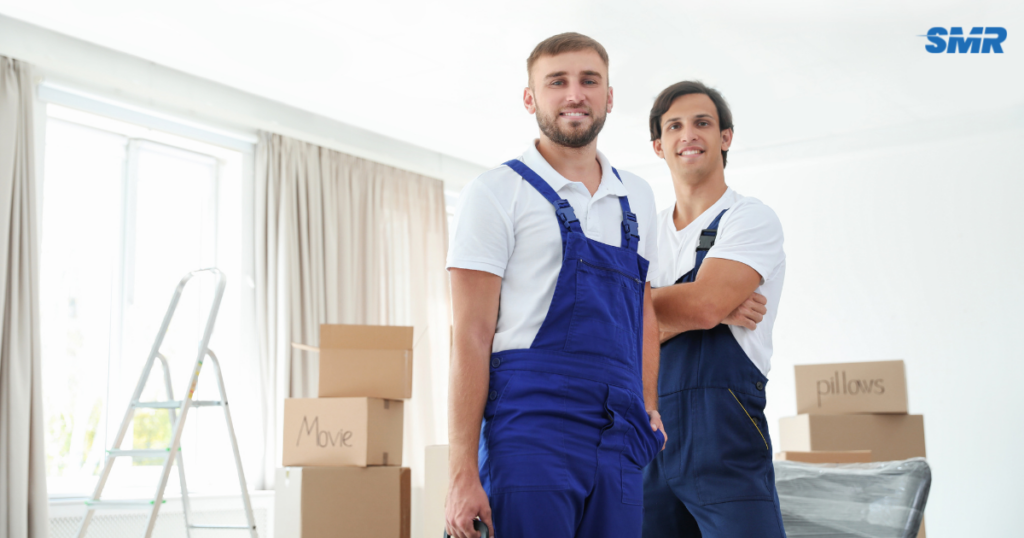 Man and Van Forest Gate movers loading furniture and boxes into a removals van
