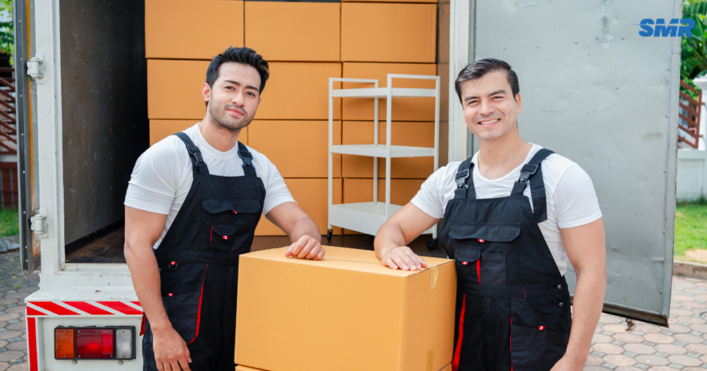 Man and van WD24 London movers loading boxes for a local removal service